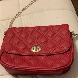 Red shoulder purse with gold detailing